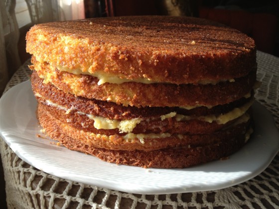 Keep stacking with a new layer of cake and filling